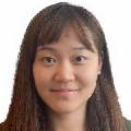 Yanqu Zheng headshot - medium-skinned woman, smiling, brown hair