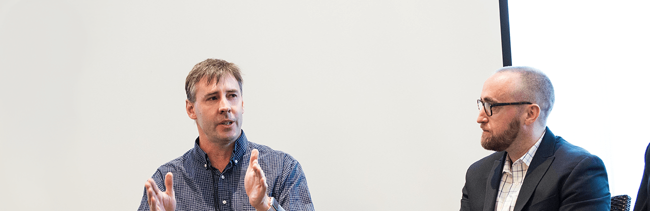 Professor Eric Legg speaking to a panel